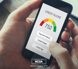 Building your credit rating takes time, but it's possible when you pay your bills on time and open various lines of credit. In this image, a credit score of 752 is shown on a cellphone screen.