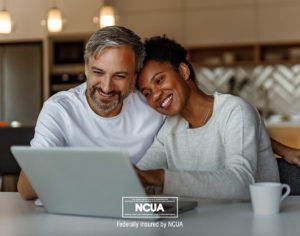 Our savings, mortgage, simple loan, and auto loan calculator can help couples, like the one in this image, plan their expenses.